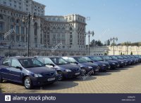 bucharest-romania-the-dacia-brand-cars-parked-in-front-of-the-parliament-D0WJP9.jpg